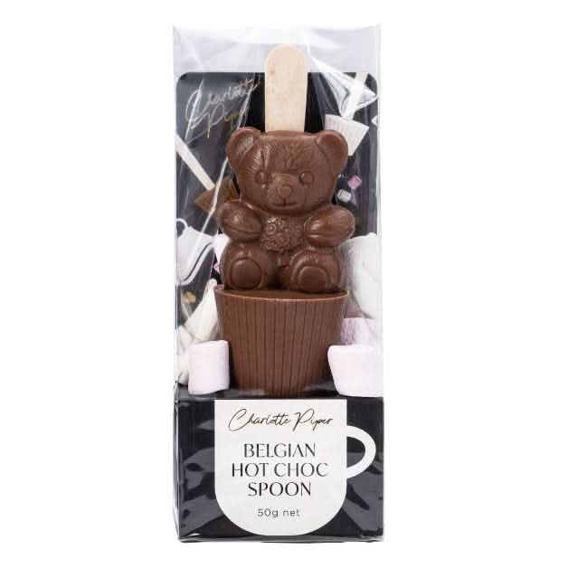 Chocolate spoon shaped like a bear in a packaging box with 'Charlotte Piper' branding.